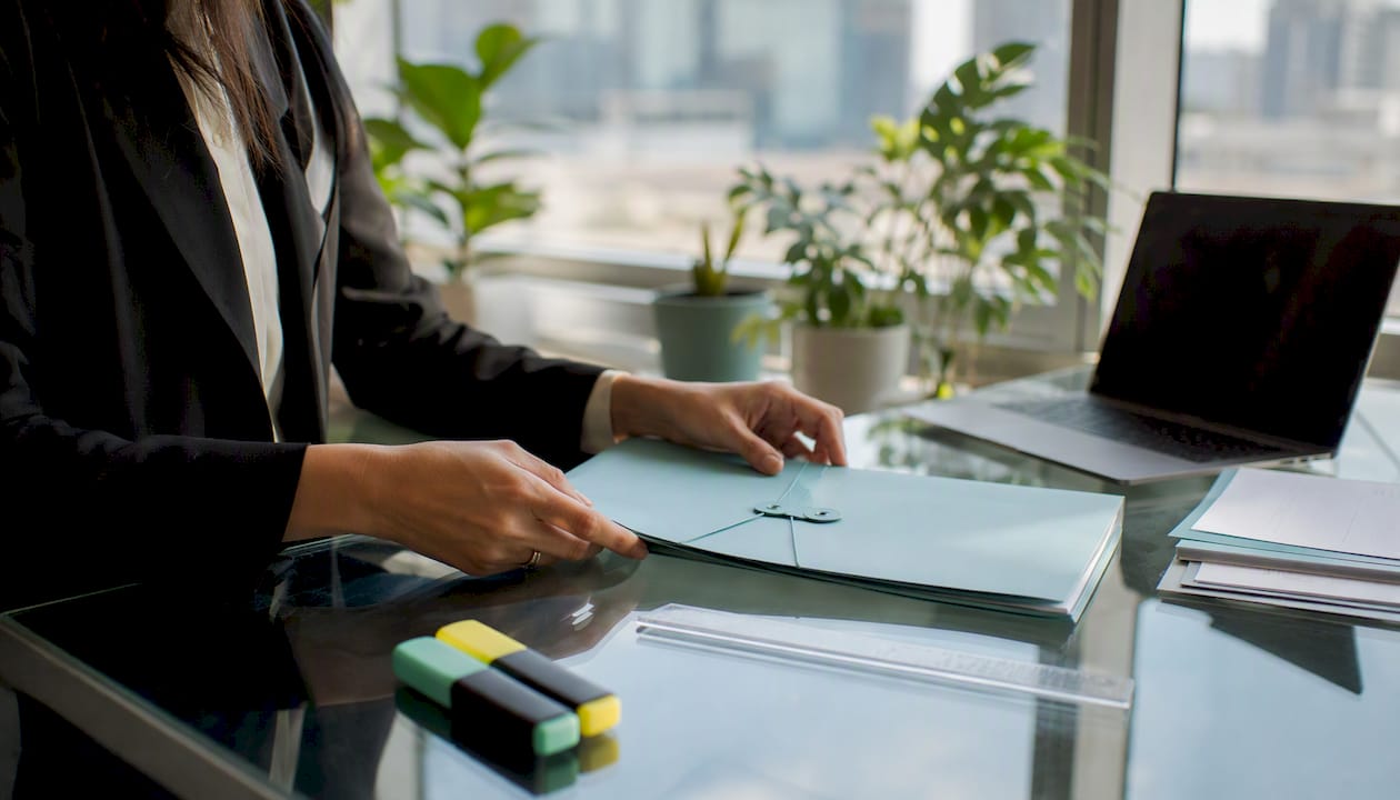 Hands adjusting property ownership documents